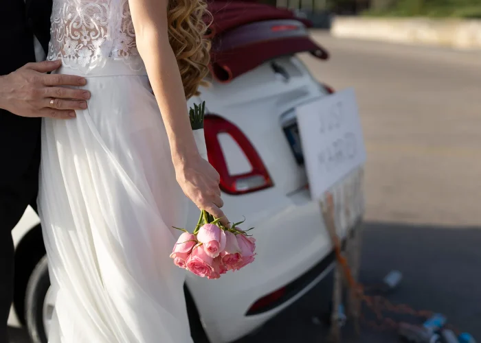 just-married-couple-little-car just-married-couple-little-car